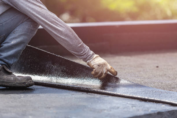 Professional Basement Waterproofing technician working in Rockwood, VA